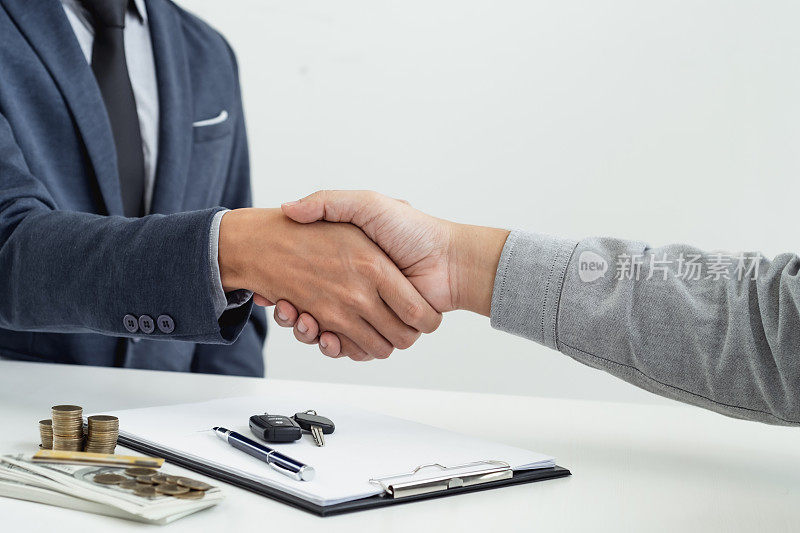 Businessman agent Handshake. Car loan insurance.Â Salesman Automobile Vehicles Concept